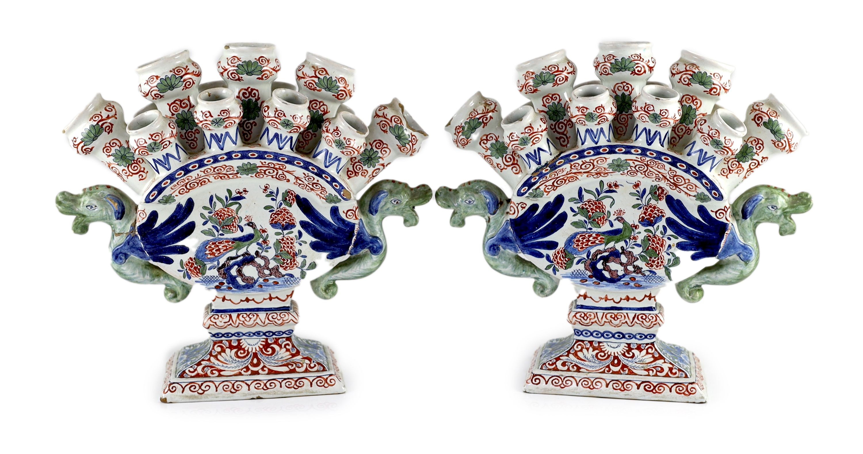 A pair of Delft polychrome multiple tulip vases, Lambertus van Eenhoorn, De Metaale Pot factory, c.1700-1720, 30cm high, 32cm wide